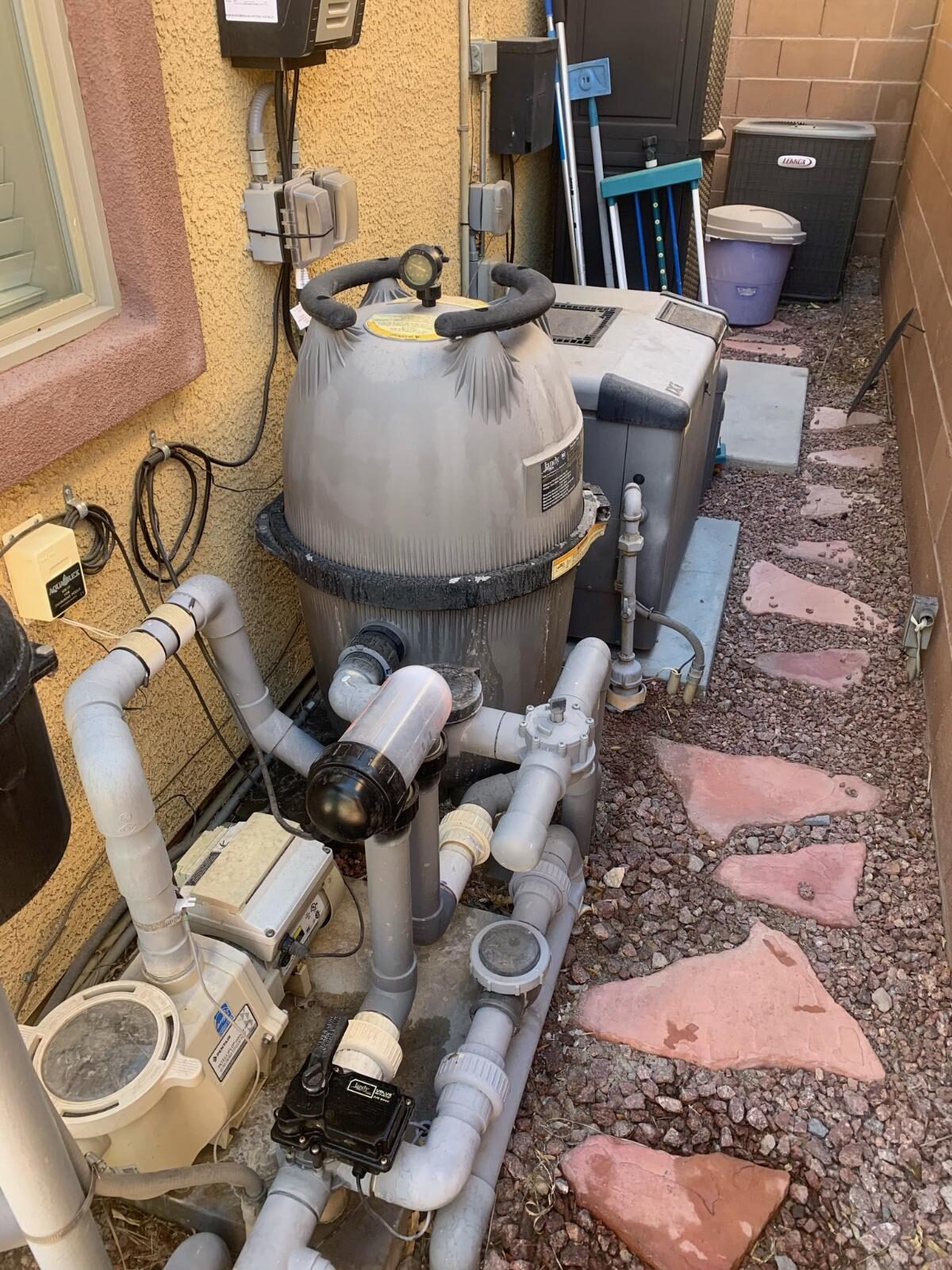 Residential pool equipment pad with automation controls and plumbing