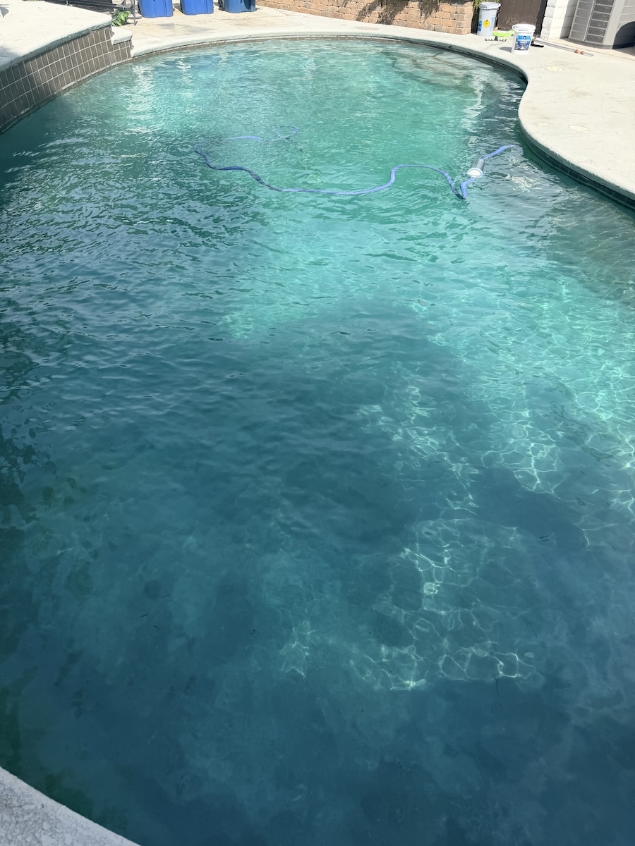 Pool after weekly service with debris removed