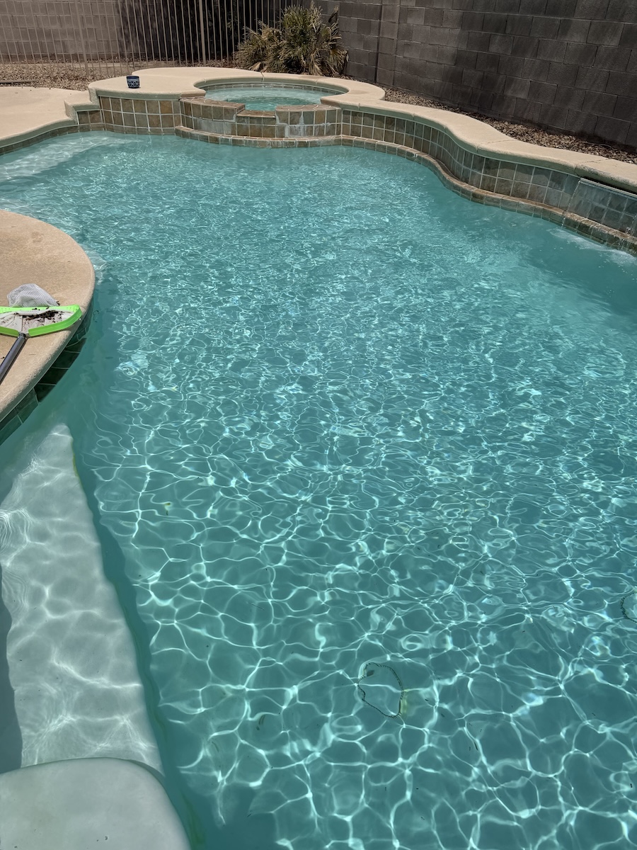 Pool after weekly service with debris removed