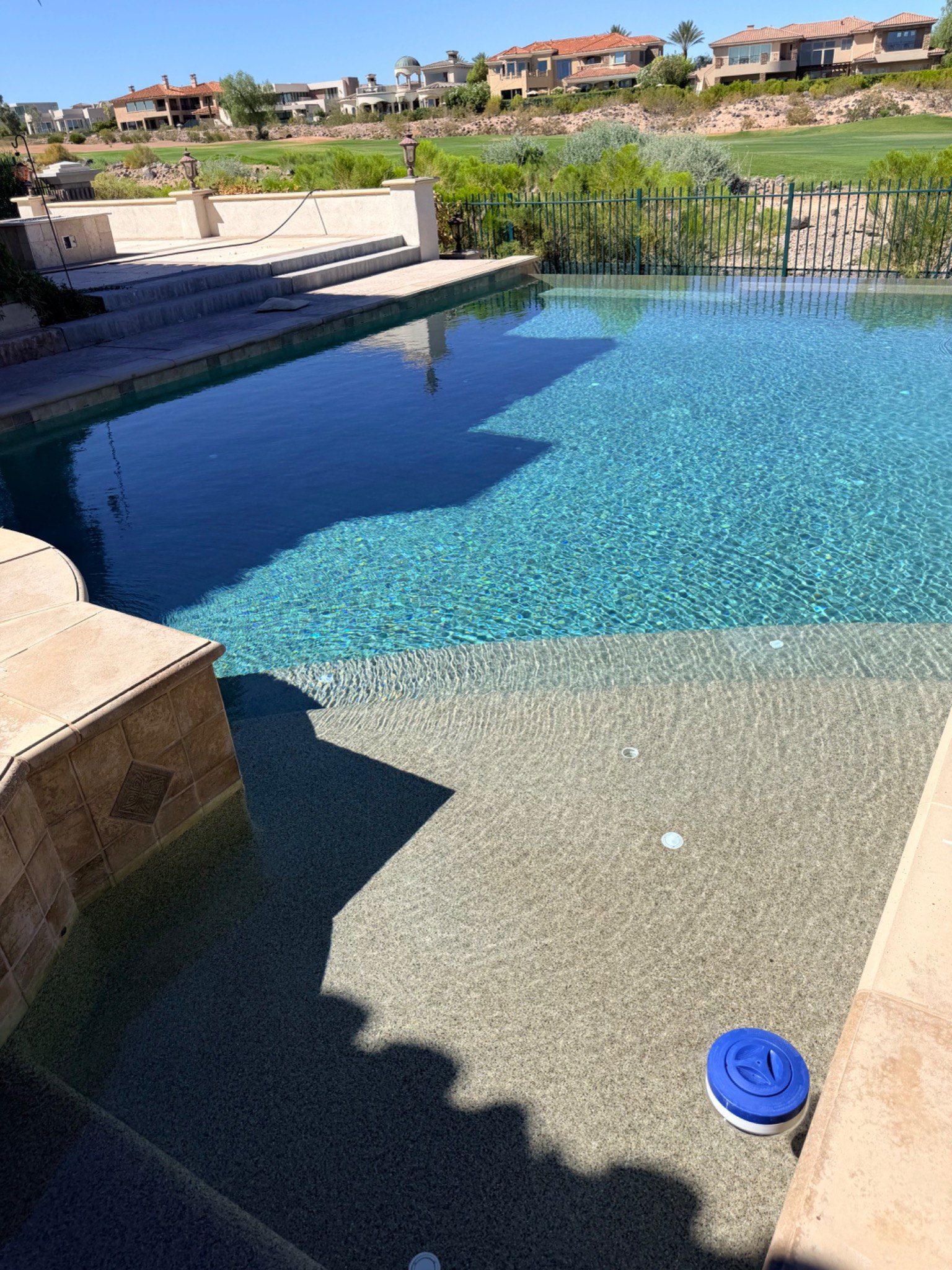 28,000-gallon pool after recovery with crystal-clear water