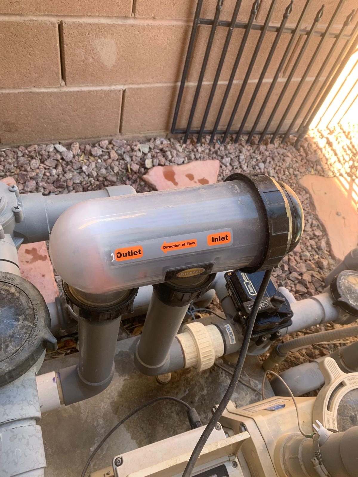 Residential pool salt chlorination cell installed in plumbing
